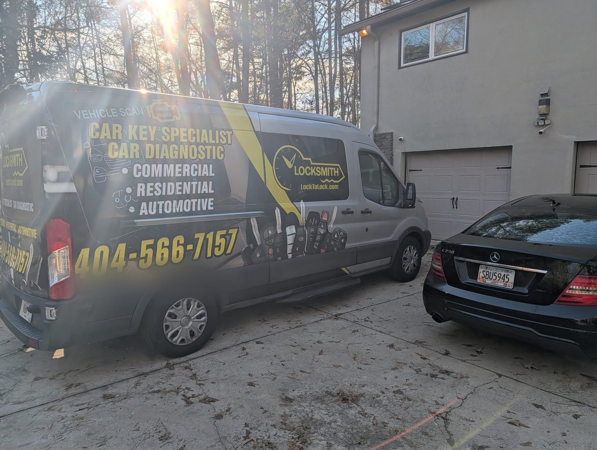 Lock to Lock mobile locksmith van at a job site in Metro Atlanta